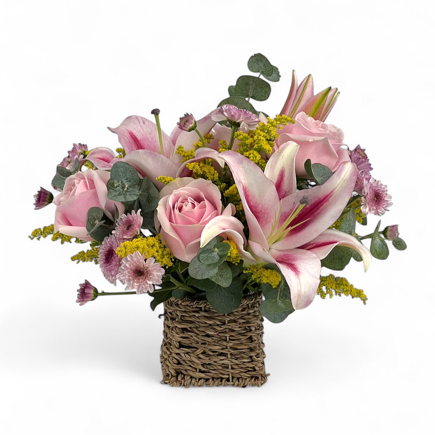 Front view of Lily Luxe flower basket with pink lilies and pink roses, arranged in a luxurious and elegant floral display.