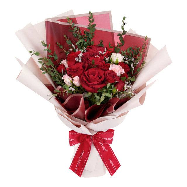 Love Divine - Flower Bouquet with red roses, pink and white flowers, lush greenery, and elegant wrapping