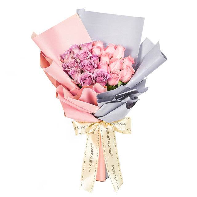 My Better Half flower bouquet with pink roses, wrapped in pink and grey paper with a ribbon bow
