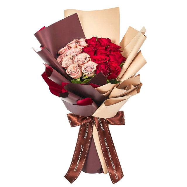 Romance in The Air premium flower bouquet with red and blush roses, wrapped in burgundy and beige paper bows